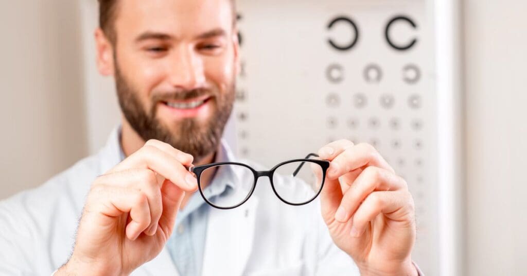 man with glasses looking at LASIK potiential